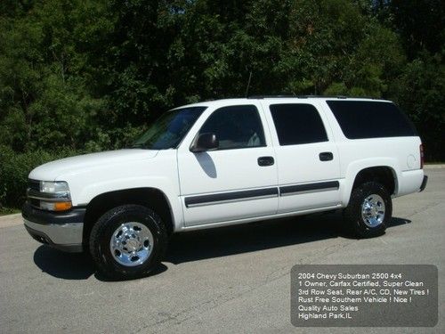 2004 chevy suburban 2500 ls 4wd 3rd row 1owner rear a/c carfax new tires ! nice