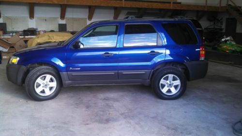 2006 ford escape 4x4  hybrid only 63,000 miles!!!!!