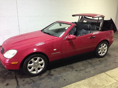 Leather convertible ac smoke free heated/power seats cd player convertible