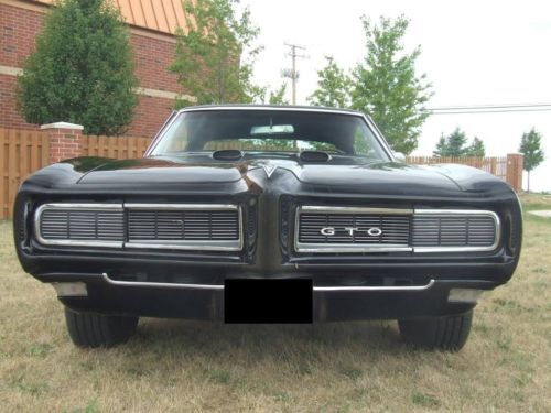 1968 gto  455 eng. 400 trans. black on black , runs, sounds and looks excellent.