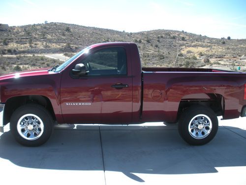 2013 chevy silverado with only 371 mi. ruby red metallic,ls package, flawless