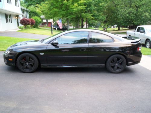 Pontiac gto,2006, phantom black, 6 speed,ls2, only 15,000 miles, must see,