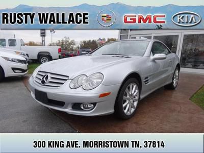 We finance/trade mercedes low miles htd leather nav pwr hard top conv smoke free
