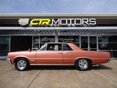 Restored and straight 64 gto with '67 400 block and tri-power