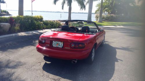 Red convertible in great condition, runs great, like new tires, automatic