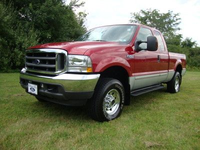 * beautiful 1 owner * low reserve low miles  4x4 extended super cab 8' long bed