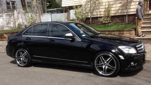 Black on black fully loaded c class with roderick wheels and eisenmann exhaust