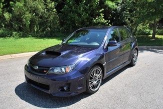 2011 blue sti wagon 6 speed manual only 2600 actual miles like new in and out