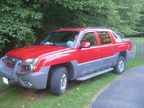 2002 red 4wd crew cab z71, leather, power heated seats, moon roof, tilt , tow