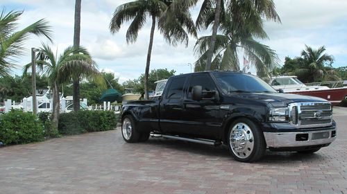2005 ford f-350 lariat 4-door dually lowered on 24inch wheels