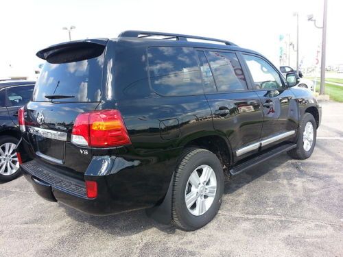 New 2013 toyota land cruiser black/sand interior in stock $8000 off msrp