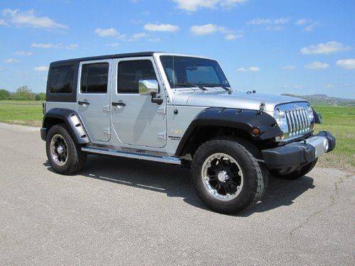 2011 jeep wrangler  unlimited sahara 4dr leather bluetooth all power perfect aux