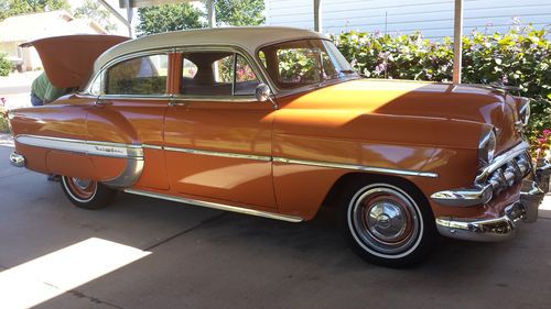 1954 chev. bel air 4 door, burnt orange, 235 6 cylinder, original dash