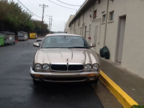 2001 xj8 leather interior great condition 107000 miles body has some nicks