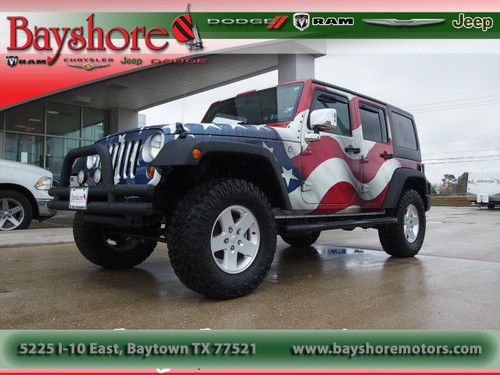 2011 jeep wrangler unlimited 4x4 manual transmission draped in the american flag