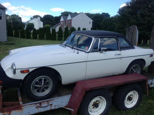 1976 mgb, 41,544 white convertible with hard top.  runs and great garage find!!!