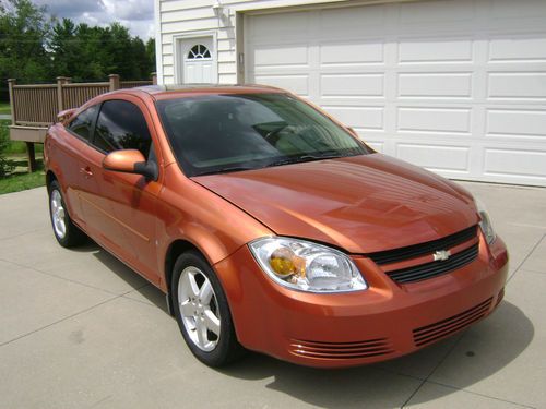 2006 chevrolet cobalt lt orange , tinted windows, well maintained vehicle