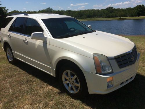2007 cadillac srx 3rd row seating pearl white