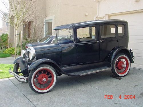 Ford 1929 model a fordoor murry,  "the pride of the parades scene"