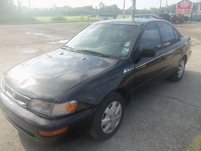 1997 toyota corolla, black, low miles, great on gas, seats five, no reserve