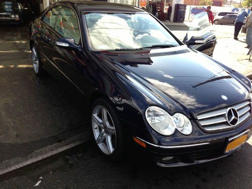 Navy blue, great condition, coupe, leather heated seats, navigation, moon roof