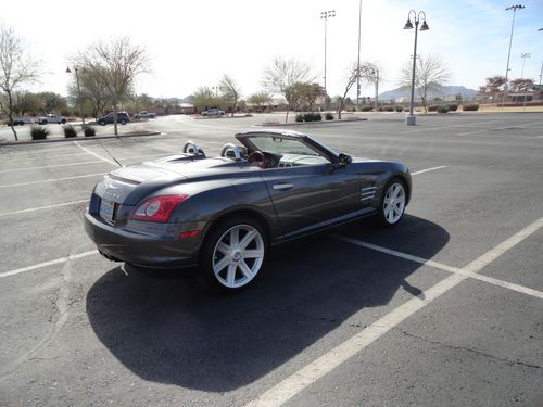 Beautiful charocal grey crossfire with red leather interior. no reserve