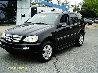 No reserve carfax 1 owner leather pl pw sr  rear dvd cd changer awd good tires