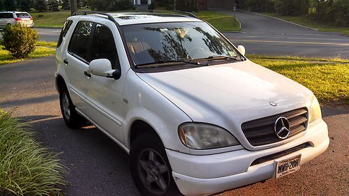 2000 ml320 white with tan leather interior, sunroof, bose, cd changer, awd
