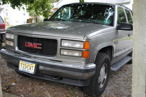 1997 gmc yukon sle 4wd leather seats tow hitch cd and cass.