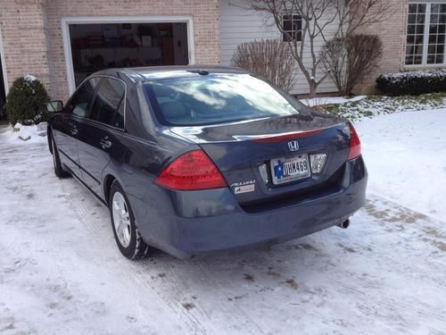 Honda accord exl 2006 67,000miles. very goood condition, loaded graphite ext.