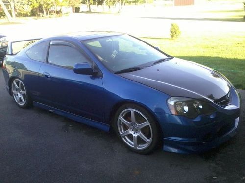 Blue, very well kept acura rsx. excellent condition.