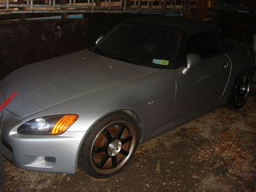 2002 honda s2000 very fast tons of bolt on mods!! lowered 18inch rims! turbo!