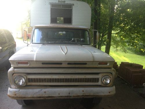 Rare1964 chevy with low miles 36,404 c30 stepside with a alaskan camper