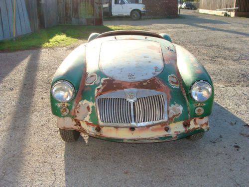 1957 mga roadster project- wire wheels.    dallas, tx