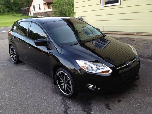 2012 ford focus se hatchback 4-door no reserve free airfare to pick up car