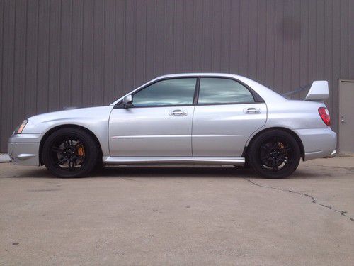 2004 subaru wrx sti -ultra clean- 6 speed very well maintained very cheap look!!