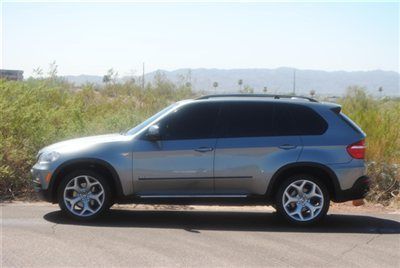 2007 bmw x5 3.0l si with upgraded 20" oem factory wheels....optional.....sprt