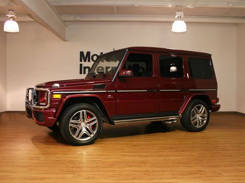 Beautiful and extremely rare storm red g63 amg with only 1,323 miles!