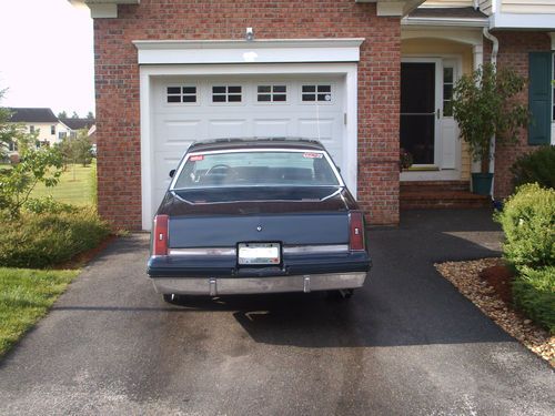 1985 oldsmobile cutlass supreme base coupe 2-door 5.7l