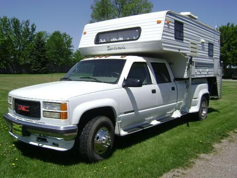 1997 gmc k3500 crew cab dually with sportsman slide in camper