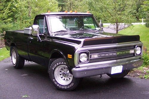 1969 chevrolet 3/4 ton pickup.  long bed, 350, black, 3 speed.  69 chevy