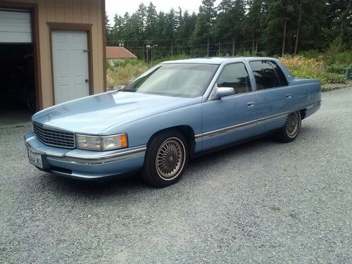 1994 cadillac deville touring ..factory diamond steel blue on slate grey