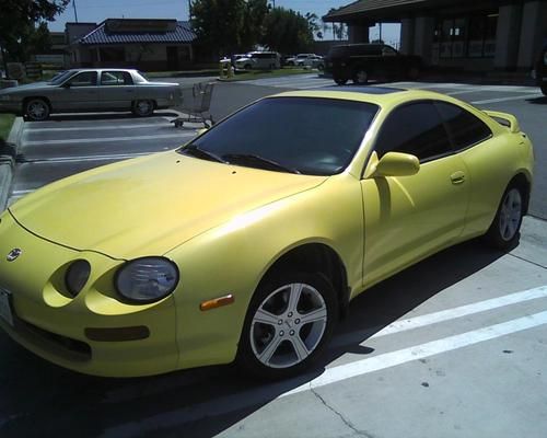 1995 toyota cel;ica gt **rare yellow**  gets 35mpg clean title new pics added!