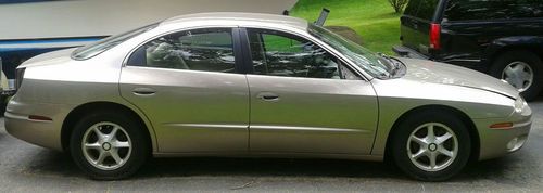 1999 oldsmobile aurora ,gold,  fwd, 4 door ,automatic, 3.5 liter