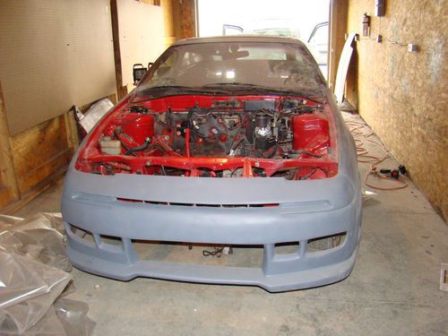 Here is a 1991 ford probe project car. motor alone is worth $3000.