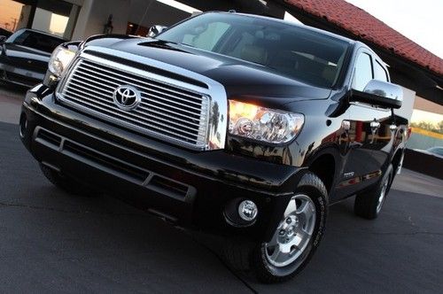2011 toyota tundra crewmax limited. 4wd/trd. leather. m. roof. loaded. blk/tan.