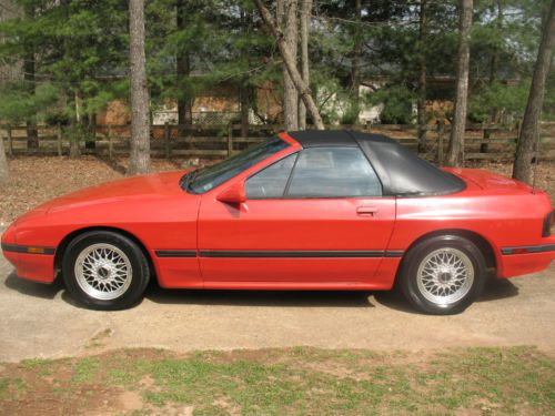 Convertible  red mazda rx-7  new top. car is in good condition . ready to ride !