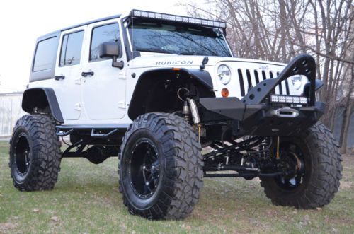 2011 jeep wrangler unlimited rubicon pitbull tires rock krawler coil overs look!