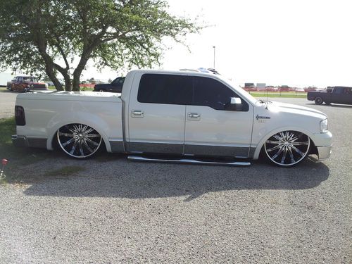 Bagged show truck 2006 lincoln mark lt on 28s laying frame not f150
