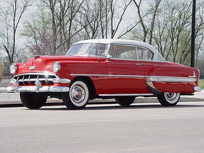 Romany red and india ivory bel air sport coupe w/2-tone interior. restored !!